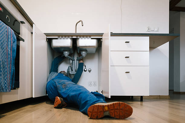 Professional Emergency Plumber technician working in Garrett Park, MD